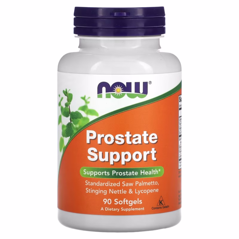 Hvit boks med NOW Prostate Support softgels stående på et bord. Etiketten viser ingredienser som dvergpalme og brennesle for prostatahelse.